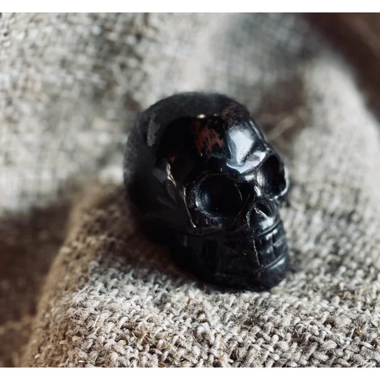 Mini kristallpealuu XS - Mahagon obsidiaan Mini kristallpealuu XS - Mahagon obsidiaan